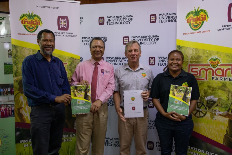 Trukai signs MOA with PNG Unitech to develop rice farming in PNG