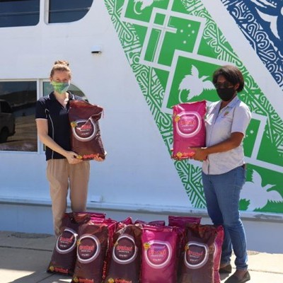 Trukai supports YWAM with rice donations